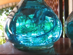 Through a bottle of blue tequila